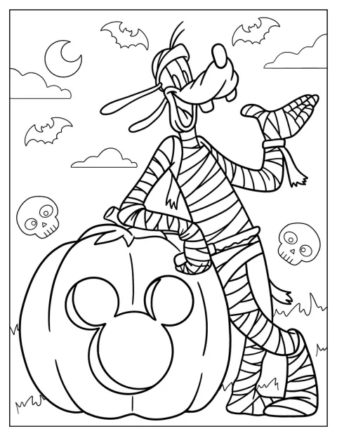 Goofy převlečený za mumii stojí vedle halloweenské dýně.
