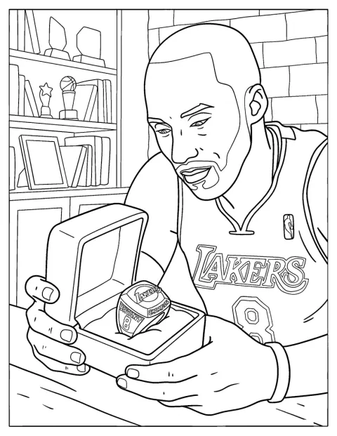 Kobe Bryant ser ned på Lakers-mesterskapsringen sin.