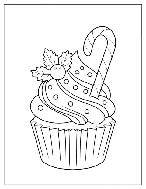 En julecupcake er pyntet med sukkerstok og kristtornbær.