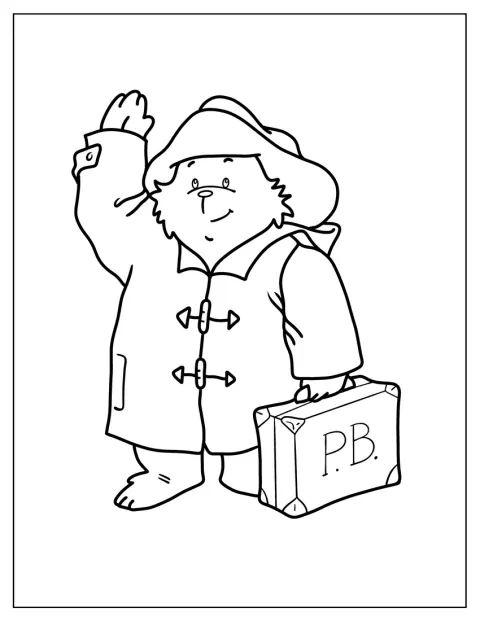 Paddington levanta una mano para saludar.