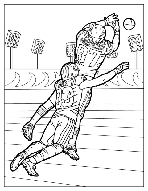 Durante una partita, un giocatore NFL viene placcato dagli avversari.