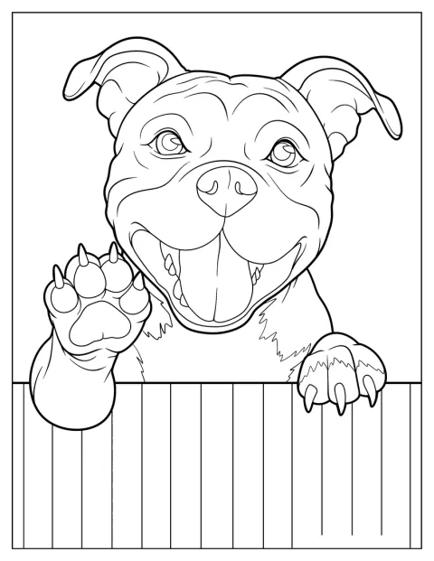 Un pitbull feliz se apoya en una valla.