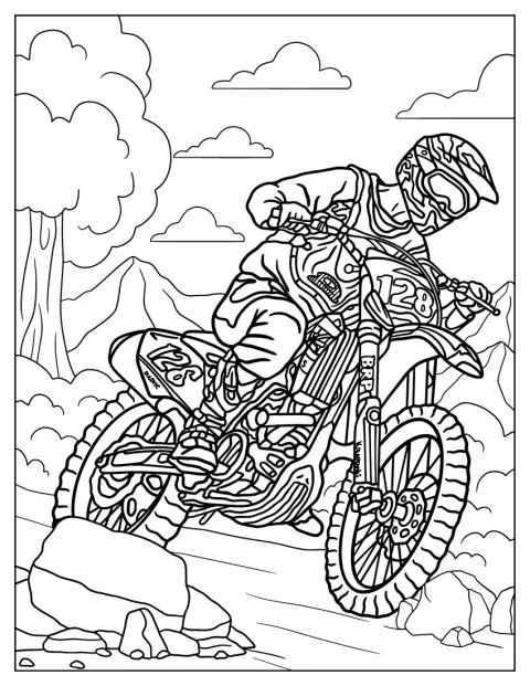 En mand kører sin Kawasaki-crosser ned ad en bakke.
