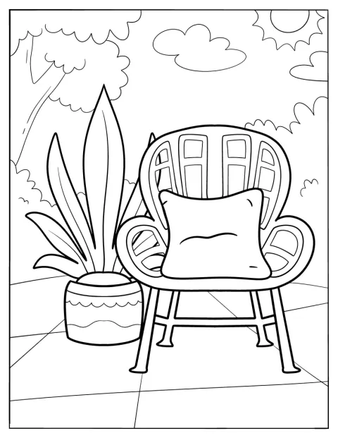 Une plante d’intérieur se trouve à côté d’un fauteuil bohème.