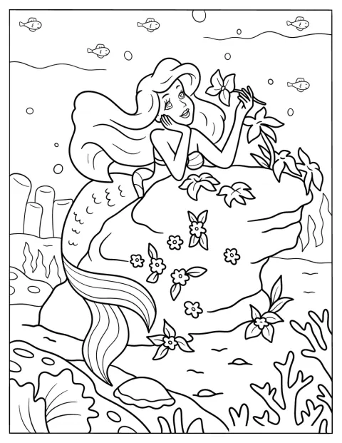 Den lille havfruen Ariel ser beundrende på en blomst.