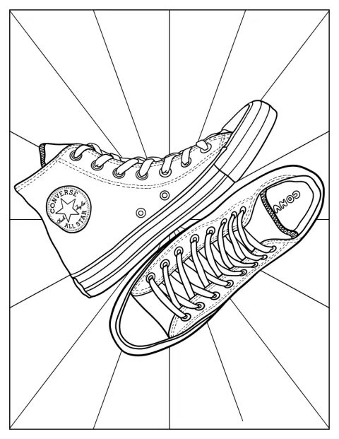 Vues de dessus, deux Converse Chuck Taylor révèlent leurs lacets et leurs bouts arrondis.