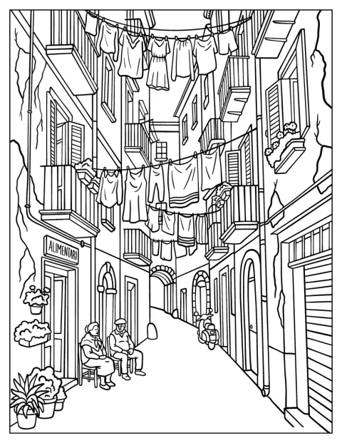 Du linge sèche au-dessus d’une ruelle étroite bordée de maisons italiennes.