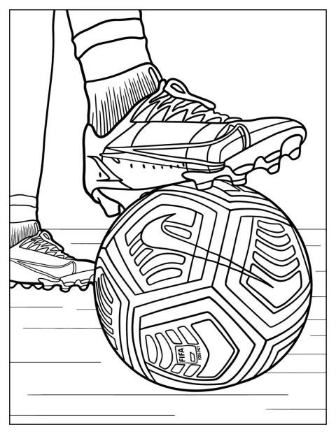Et par Nike-fodboldstøvler ligger ved siden af en bold.