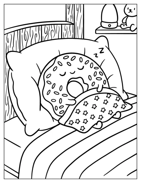 Un donut couvert de vermicelles dort sous une couverture constellée d’étoiles.