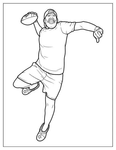 Tyler Toney hoppar högt med en amerikansk fotboll i händerna.