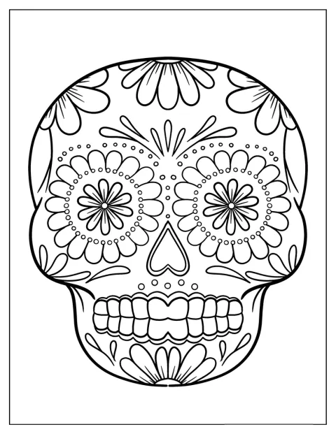 Uma caveira mexicana apresenta padrões de flores por toda a superfície.