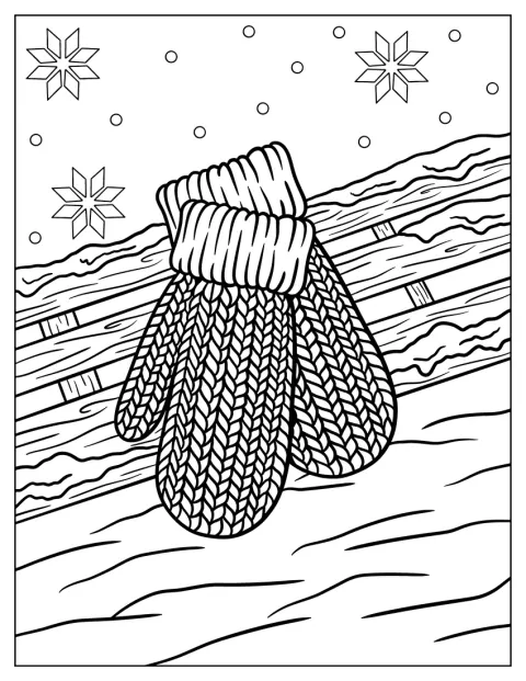 Des moufles en tricot reposent sur une surface en bois.