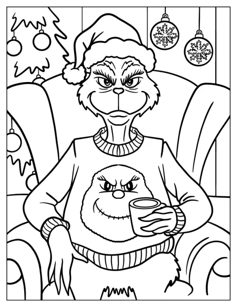 Il Grinch indossa un maglione con il suo volto e tiene una tazza di tè.