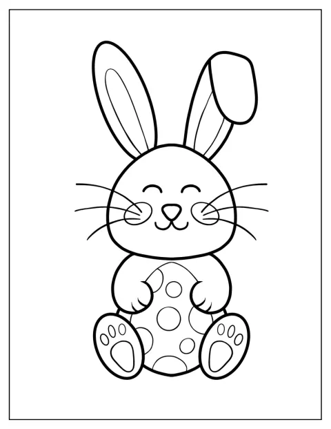 El conejo sonríe mientras abraza un huevo decorado con lunares.