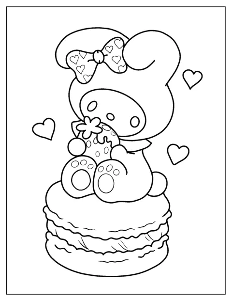 My Melody sitzt oben auf einem großen Macaron.