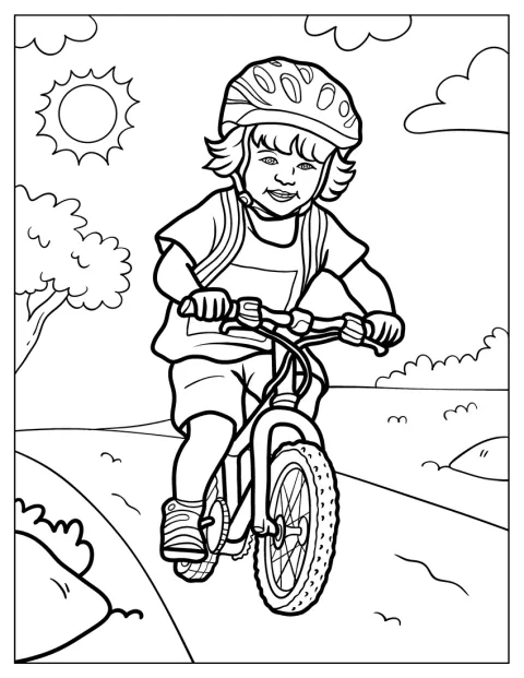 小さな男の子が、公園の中を自転車で走っています。