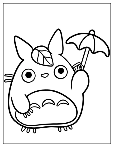 A kicsi, chibi stílusú Totoro apró esernyőt tart.