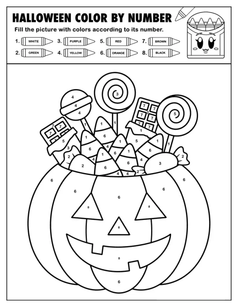 Caramelle fanno capolino dall’apertura di una zucca intagliata.