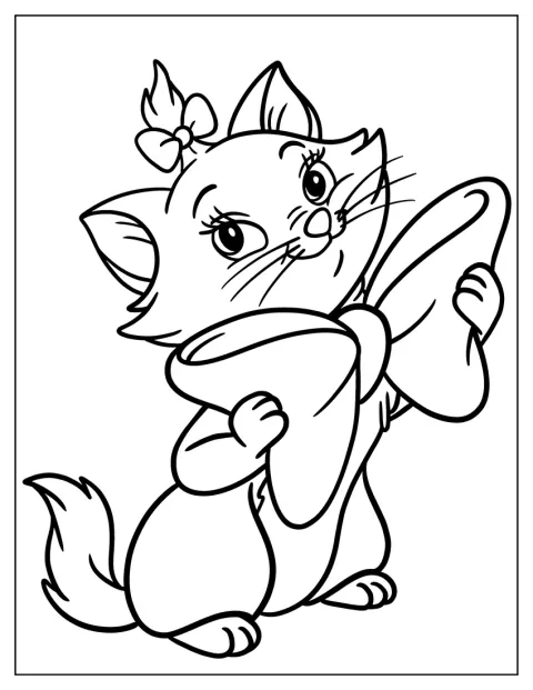 Marie, le chaton blanc, porte un grand nœud sur la tête.