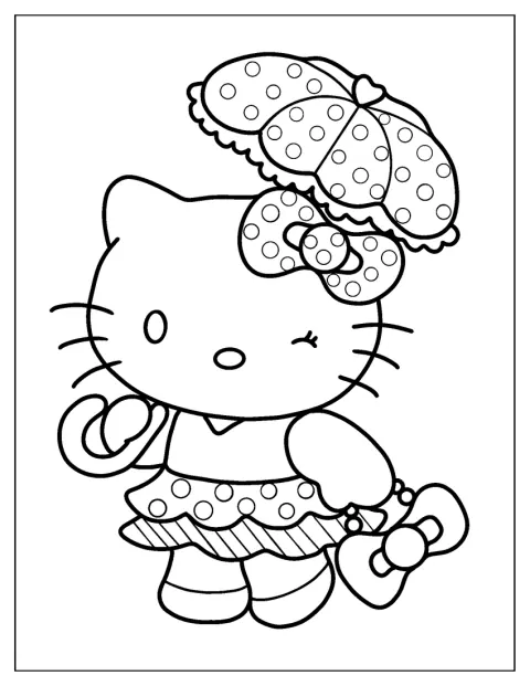 Hello Kitty porte une tenue décorée de pois.