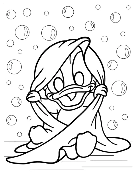 Malý Donald odpočívá schovaný pod přikrývkou.
