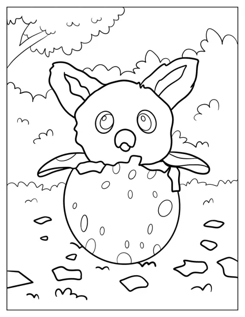 Un Owlicorn Hatchimals se niche dans sa coquille ouverte.