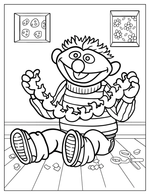 Ernie houdt papieren eendjes omhoog.
