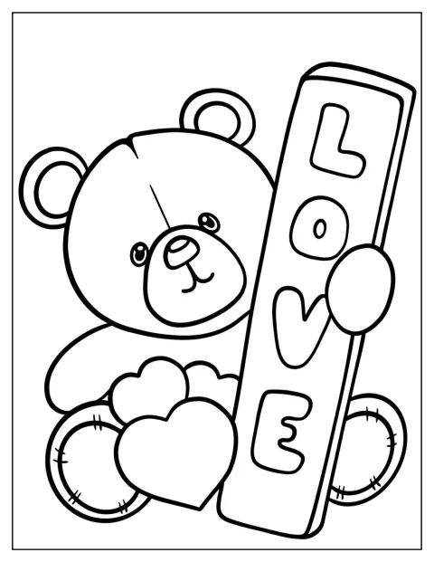 Un osito de peluche sostiene un cartel con un mensaje de amor.