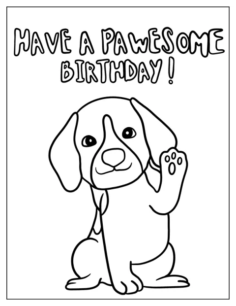 子犬が前足を上げて、誕生日のお祝いをしています。