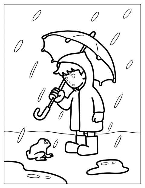 雨の中、男の子がカエルを見つめています。