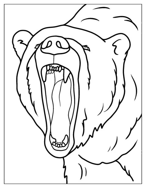 Un oso polar abre la boca y ruge.